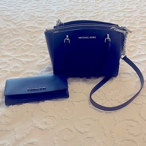 Blue Michael kors shoulder bag and wallet.